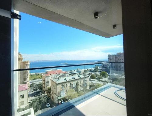 a view of a city from a window in a building at Baku Sabah Apart in Baku
