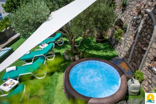 an overhead view of a swimming pool in a resort at Casa Francisca in Praiano