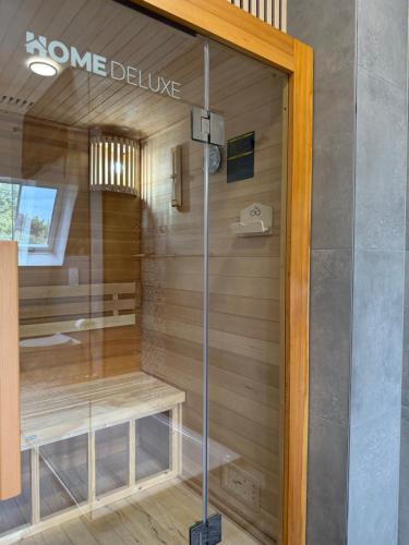 a store window with a sign that reads some divine at Pro Home Mara private Sauna in Bad Oeynhausen