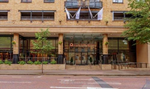 a store front of a building on a city street at Clayton Hotel Belfast City in Belfast
