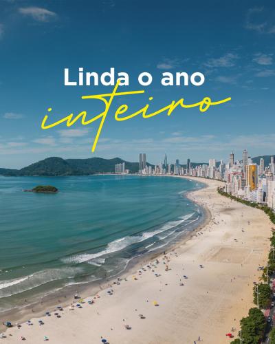 a view of a beach with the words limo and infinity at Hotel Melo in Balneário Camboriú