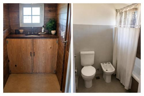 a bathroom with a toilet and a sink at La Chacra de Pilar in Pilar