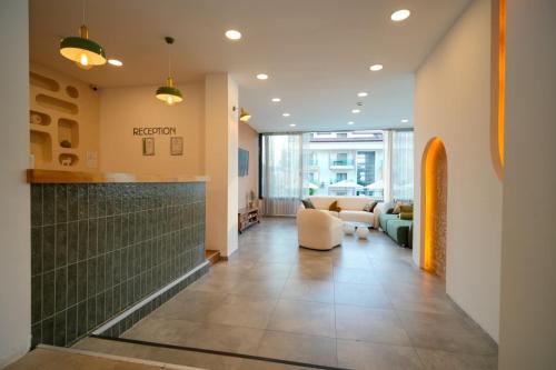 a lobby of a hospital with a waiting room at AViSOS HOTEL & APARTMENTS in Marmaris