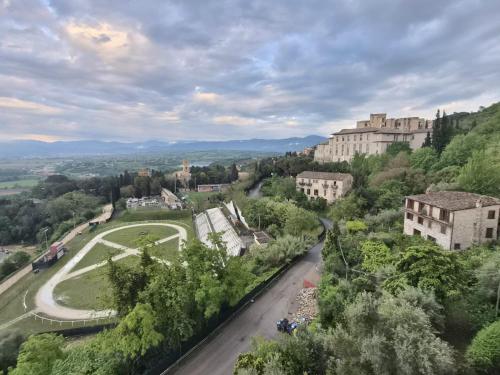 a view of a city with a road and buildings at B&B Home XIX in Narni