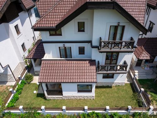 an aerial view of a house with red roof at MonteBreza Spa Apartment Jacuzzi, Sauna & Free Parking in Kolašin
