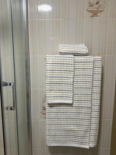 three towels are stacked on top of a shower at The Country Haven Aircode V31Y166 in Ballybunion