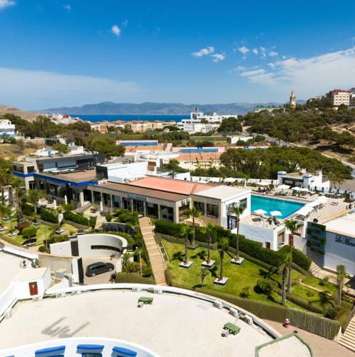 an aerial view of a resort with a pool at Mira Palace Hotel in Al Hoceïma