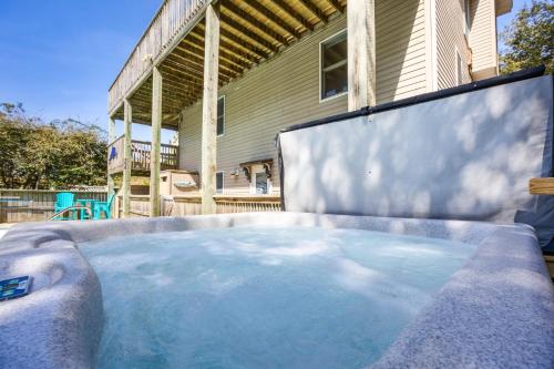 a hot tub in the backyard of a house at 2020 - Merryweather in Sanderling