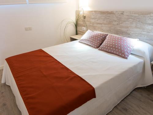 Postel nebo postele na pokoji v ubytování BelleVue Club