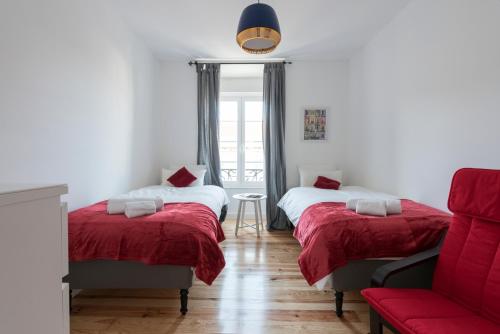 מיטה או מיטות בחדר ב-Casa Eclea Lisbon Great Apartment with terrace