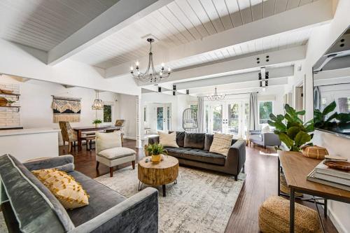 a living room with a couch and a table at Paradise in the Palisades in Lake Arrowhead