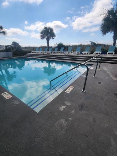 Beachfront Bliss 3BR Oceanfront Condo with Pool and Hot Tub photo 10
