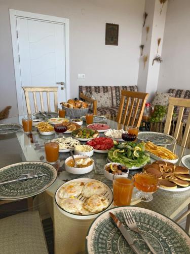 a table with plates of food on it at Unique Villa in Cappadocia in Ürgüp