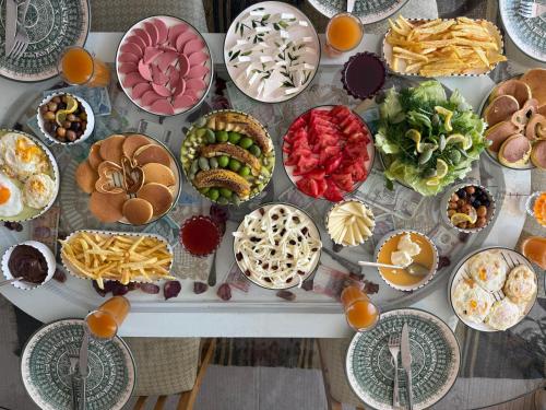 a table topped with lots of different types of food at Unique Villa in Cappadocia in Ürgüp
