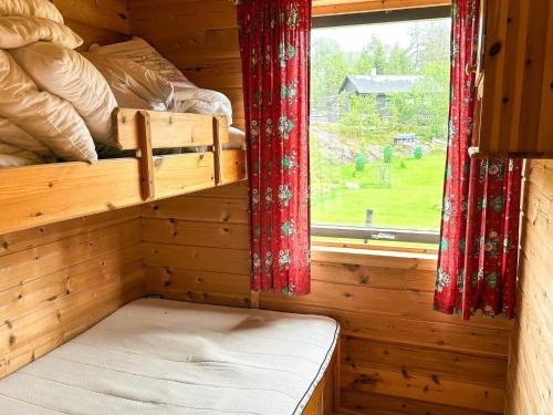a room with two bunk beds and a window at 8 person holiday home in Jelsa-By Traum in Jelsa