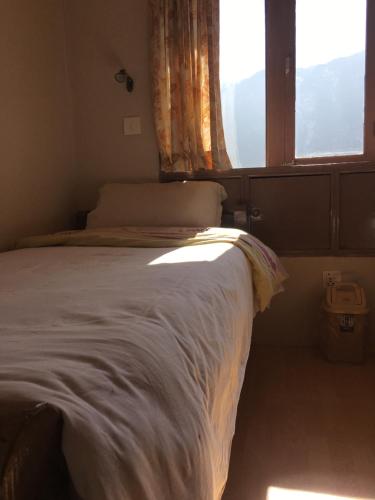 Cama o camas de una habitación en Hotel Khangri