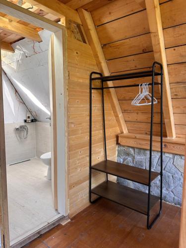 a bathroom with a bunk bed in a attic at Retreat Komovi in Andrijevica