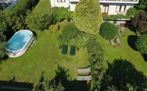 an overhead view of a garden with a boat on it at Villa Aida in Milan