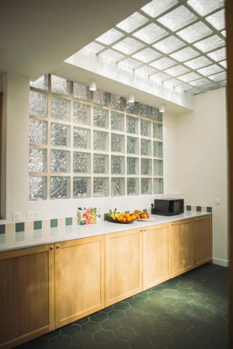 a kitchen with a counter with oranges on it at Grand Juste in Marseille