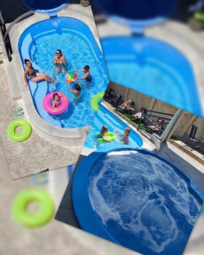 a group of people in a swimming pool at Хотел PERLA in Strelcha