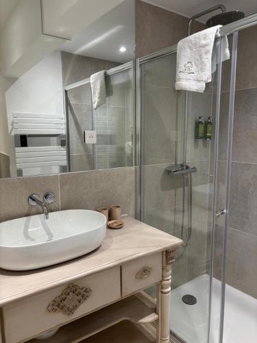a bathroom with a sink and a shower at Villa Hautvallon - Peaceful Escape in Provence in Gordes