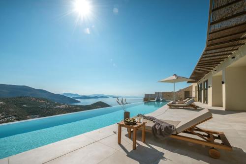 a villa with a swimming pool with a view at Villa Symposium Infinity in Sivota