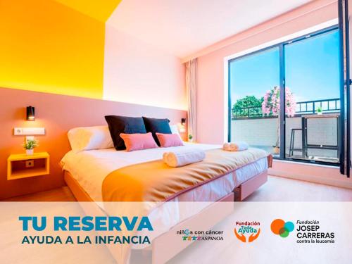a bedroom with a bed and a large window at La marina sunset 3000 in Soto de la Marina
