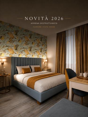 a bedroom with a large bed in a room at PFA Hotel - Viareggio in Viareggio