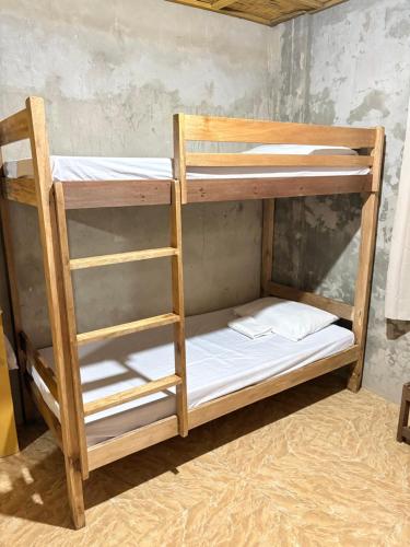a pair of bunk beds in a room at Uya Mina Homestay in General Luna
