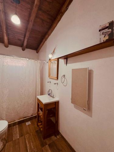 a bathroom with a sink and a toilet at Apartamento Cerrito in San Rafael