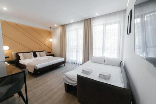 Tempat tidur dalam kamar di Select Hotel