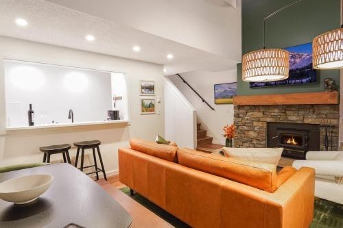 a living room with a couch and a fireplace at Crystal Creek Retreat in Bellingham