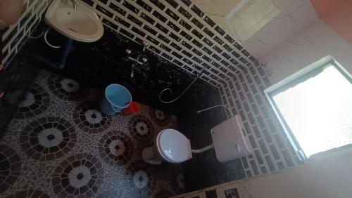 an overhead view of a bathroom with a window at Heera BEACH WAVE STAY in Gokarn