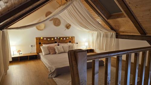 a bedroom with a bed with a wooden headboard at Apartments Beck - Super Central in Sombor