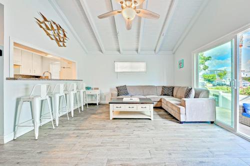 a living room with a couch and a table at Balboa Duplex in Newport Beach