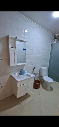 a bathroom with a sink and a toilet at اولاد بونار in Jijel