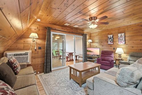 a living room with a couch and a table at Chalet #39 in Stevensville