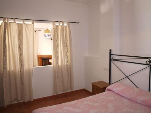 Ένα ή περισσότερα κρεβάτια σε δωμάτιο στο Apartahotel 4 vientos