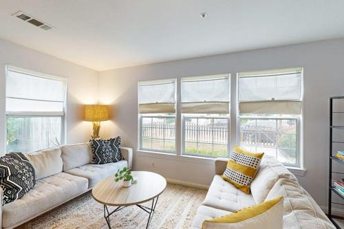 a living room with a couch and a table at Dune Delight in Arroyo Grande