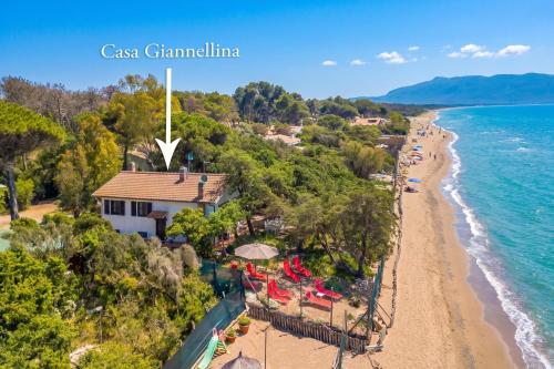 an aerial view of a beach with a resort at Casa Giannellina - Happy Rentals in Orbetello