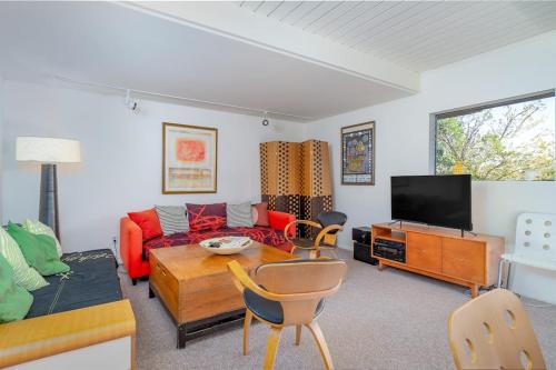 a living room with a couch and a table at The Silver Lady in Cambria