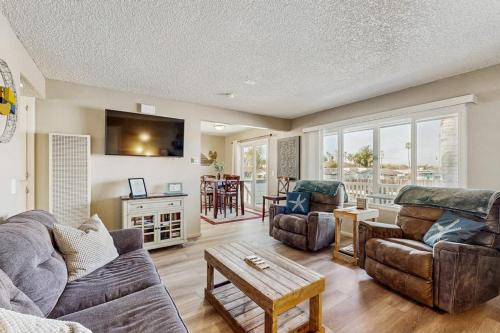 a living room with a couch and a table at Ramona Memories in Grover Beach