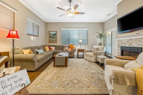 a living room with couches and a fireplace at Berry House in Arroyo Grande