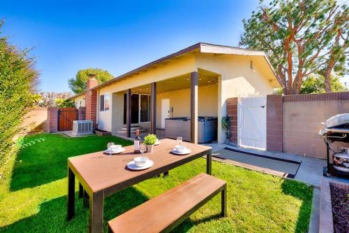 a picnic table in the yard of a house at Dream Getaway in Anaheim