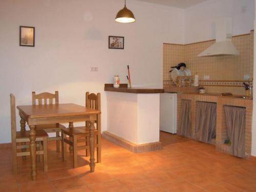 Η κουζίνα ή μικρή κουζίνα στο Apartahotel 4 vientos