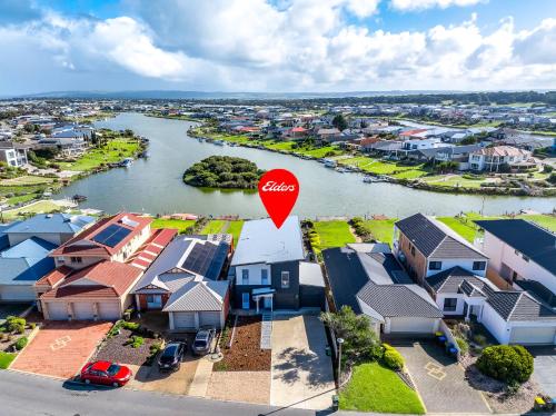 an aerial view of a suburb with a stop sign at Marina Breeze - Excelsior Pde in Hindmarsh Island