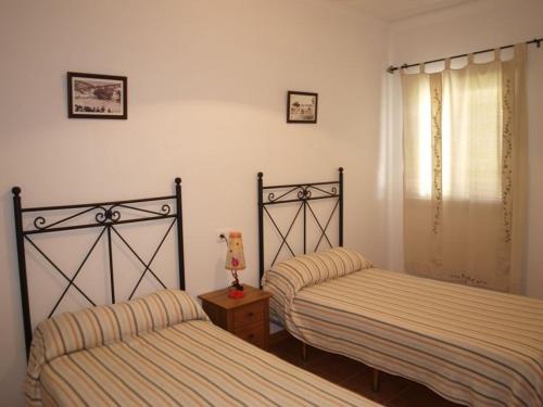 Ένα ή περισσότερα κρεβάτια σε δωμάτιο στο Apartahotel 4 vientos