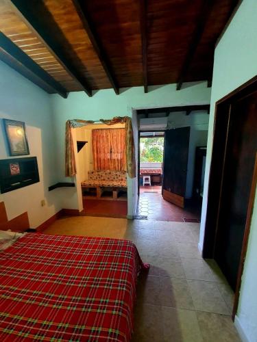 a living room with a bed and a couch at Toucherit Standar in La Mira