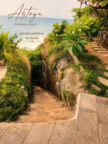 a sign that reads altecophone says private pathway to beach at Asteya boutique stays in Varkala