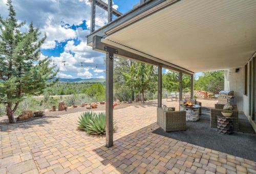 an outdoor patio with a pavilion with a roof at Prescott Mountain Luxury Escape! in Prescott